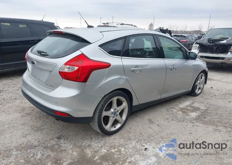 2012 Ford Focus Titanium z USA, uszkodzony, nr VIN 1FAHP3N25CL300457